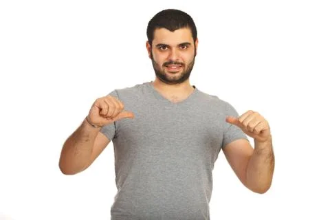 Casual man pointing to his blank tshirt Foto stock