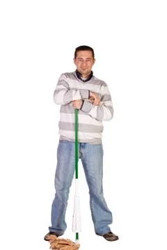 Casual man posing with a sweeper Stock Photos