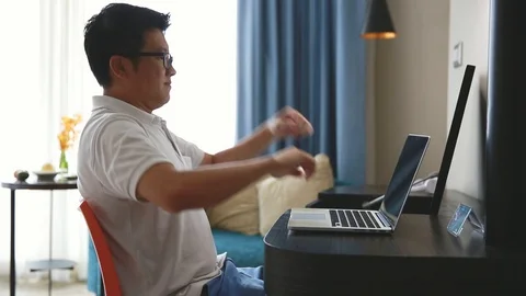 Casual man relaxing using computer notebook Stock Footage 91089480
