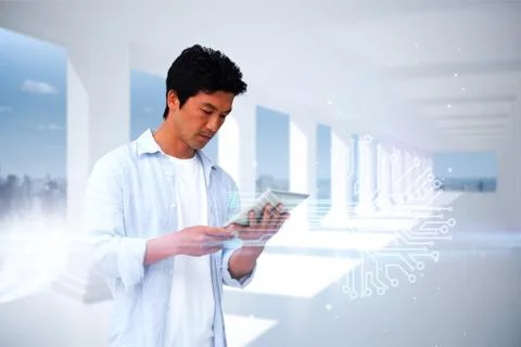 Casual man using tablet with circuit board Illustrazione stock
