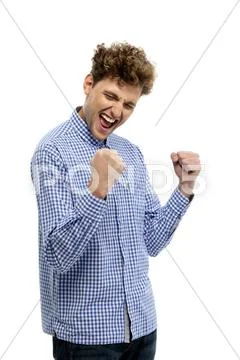 Casual man winning and celebrating - isolated over white Stock Photos