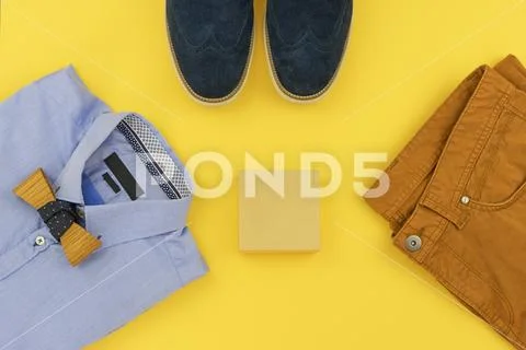 Casual outfits for men clothing set on yellow Stock Photos