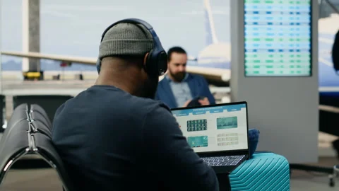 Casual startup representative checking insights and evaluation data on laptop Stock Footage 339644193