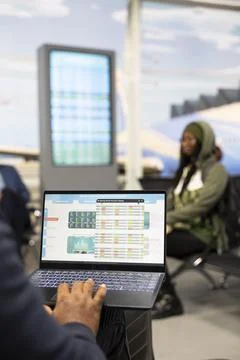 Casual startup representative checking insights and evaluation data Stock Photos
