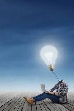 Casual student with lamp head using laptop Stock Illustration