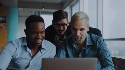 Casually dresed office workers, delighted by their achievements Video stock 99636275