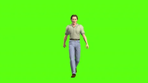 Casually dressed young man walking on green screen Stock Footage