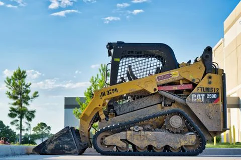 CAT 259D Compact Track Loader side view. Stock Photos
