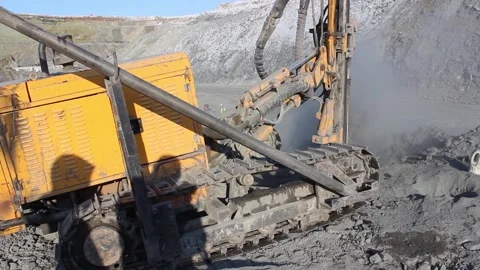 Cat 36The drilling rig does its job in an open pit. Drill is drilling. 스톡 동영상 124192766