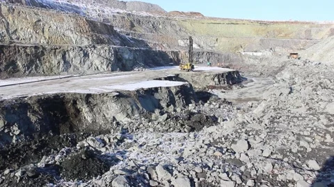 Cat 38A drilling rig is being prepared for work in a mining quarry. Stock Footage 124192782