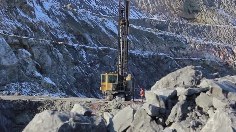 Cat 40A drilling rig is being prepared for work in a mining quarry. Stock Footage 124192793