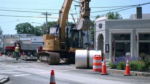 Cat Excavator Operating At Residential Construction Site, Lifting &amp; Moving Large Stock Footage 76768533