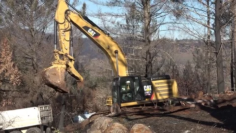 Cat Excavator spinning round Stock Footage 84625518