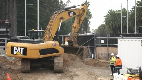 CAT Excavator Working On Construction Site 動画素材 248434711