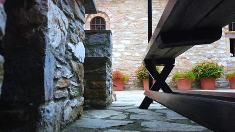 Cat Exploring the Grounds of a Monastery on Skiathos Island, Greece Vídeos de archivo 348437010