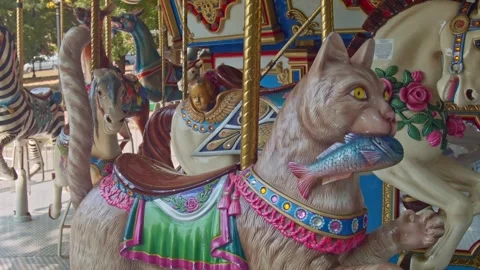 Cat figure close up at Merry Go Around during non working hours Stock Footage 303622211