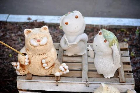 Cat Frogs Statuettes Stock Photos