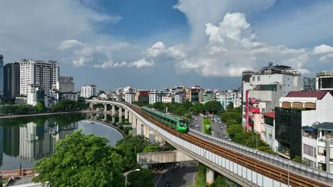 Cat Linh Ha Dong Metro Train Passing Over Dong Da Lake in Hanoi, Vietnam Stock Footage 344742802