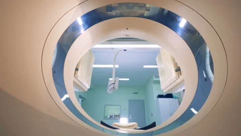 CAT-scanner on its elements getting adjusted. An empty MRI CT PET scanner. Stock Footage 90087045
