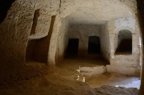 Catacombs inside ancient necropolis, archaeological park Tombs of Kings,Cyprus Stock Photos