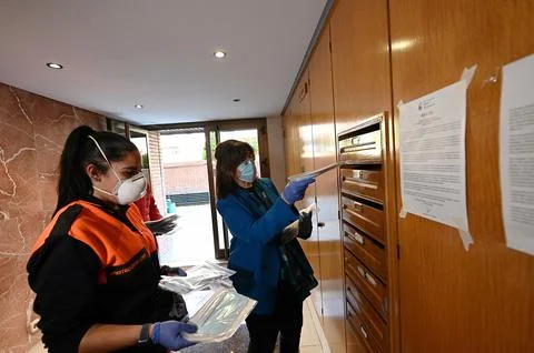 Catalan authorities distribute protective face masks, Pozuelo De Alarcon, Spain  Fotos Stock