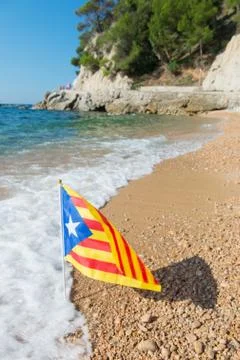Catalan flag at beach Stock Photos