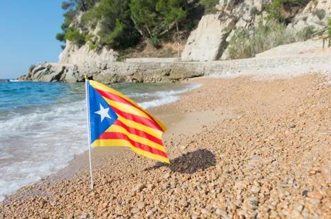 Catalan flag at beach Stock Photos