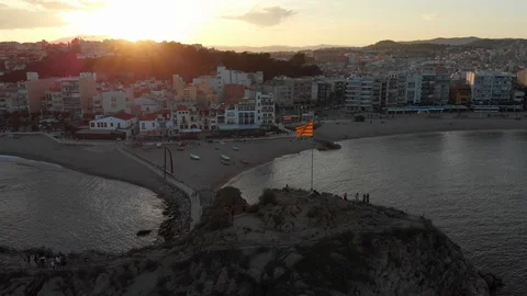 Catalonia Flag by the Coast  in Sunset Stock Footage 113458814