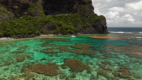 Catamaran Anchored at Fronton Beach from Above-23 Stock Footage 337437737