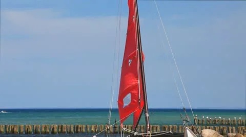 Catamaran on the beach of the Baltic Sea Stock Footage 11134619