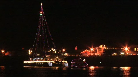 Catamaran decorated with lights by pier Stock Footage 295359