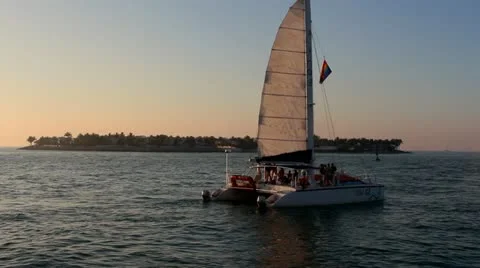 Catamaran in early sunset Stock Footage 21768542