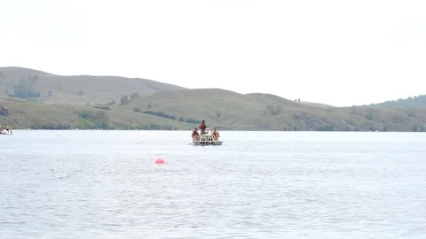 Catamaran floating on the river Stock Footage 114316665