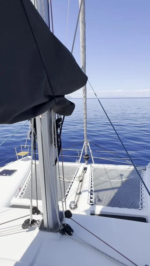 Catamaran Foredeck with Relaxing Nets in Greece Stock Footage 336965020