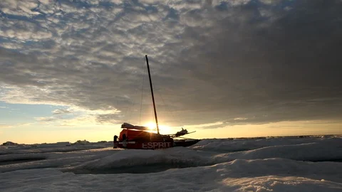 Catamaran in front of the sunset the North Pole - Time Lapse Video stock 104962379