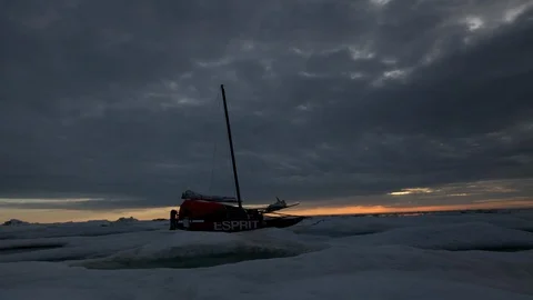 Catamaran in front of the sunset the North Pole - Time Lapse Stock Footage 104962429