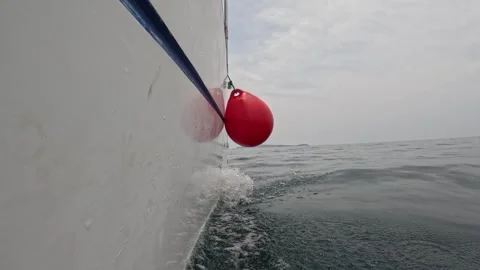 Catamaran glides through the sea Stock Footage 243410827