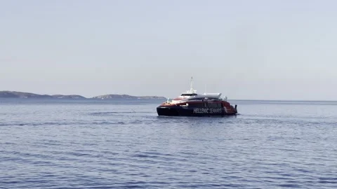 Catamaran high speed FLYINGCAT 6 of Hellenic Seaways leaving the port of Hydra Stock Footage 160781605