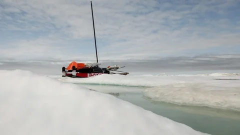 Catamaran on the ice floe at the North Pole - Time Lapse Video stock 104960503