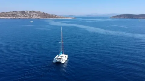 Catamaran Motoring on a calm Mediterranean Sea Stock Footage