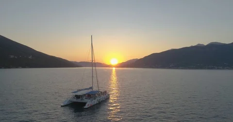 Catamaran party in sunset Video stock 99714831