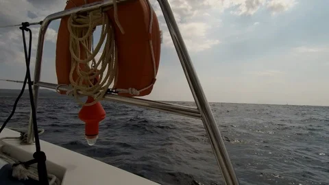Catamaran Sailboat side view of the hull in navigation Stock Footage 95833113