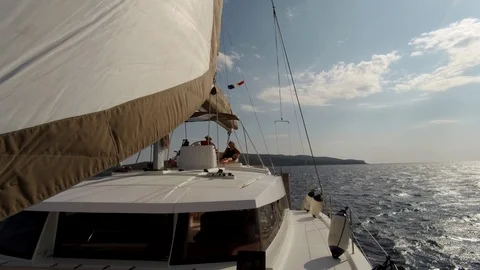 Catamaran Sailboat, view from the bow during navitation Stock Footage 95835647