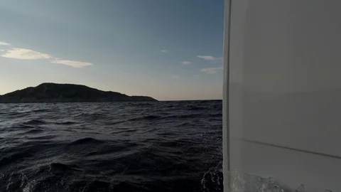 Catamaran Sailboat view of the bow in navigation with waves Stock Footage 95896037