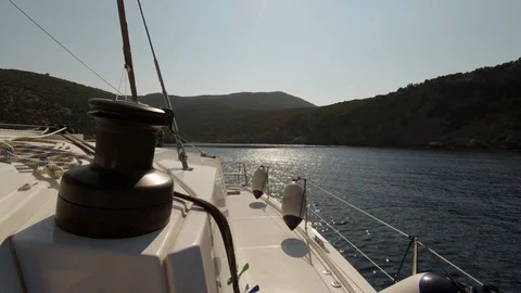 Catamaran Sailboat, view of the deck side and the wiinch at sunset Stock Footage 95834148
