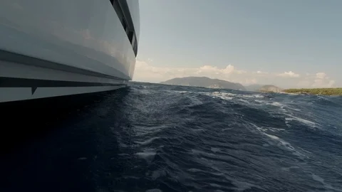 Catamaran Sailboat view under the hull in navigation with waves running fast Stock Footage 95835934