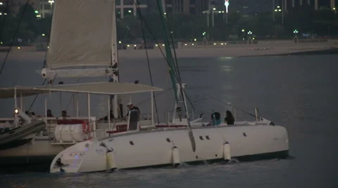 Catamaran sailing in Abu Dhabi in the evening  Stock Footage 43316631