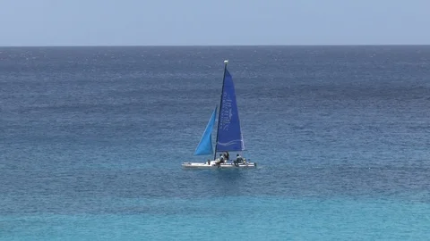 Catamaran Sailing Off Of Barbados Stock Footage 107943631