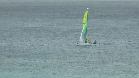 Catamaran Sailing Off Of Barbados Stock Footage 107943769