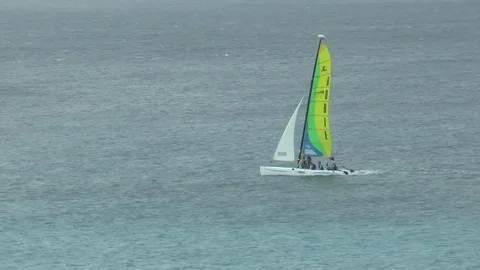 Catamaran Sailing Off Of Barbados Stock Footage 107944152